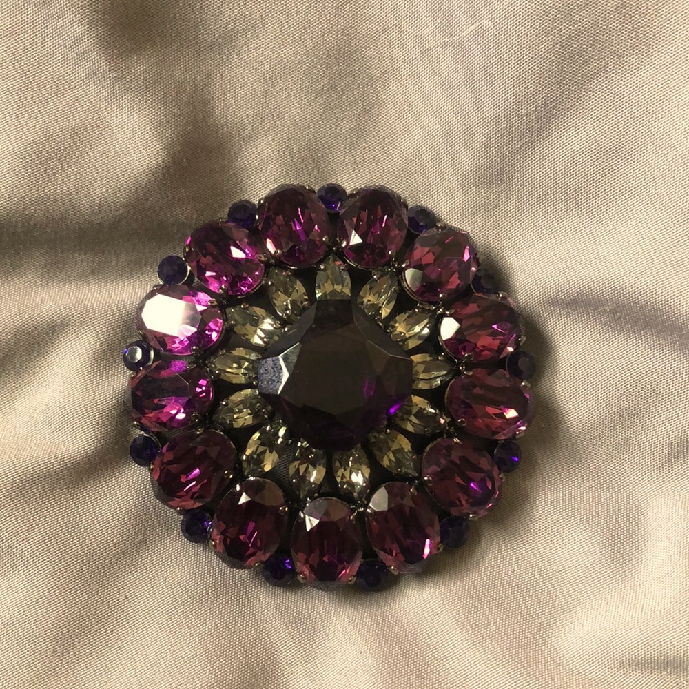 Dolce & Gabbana brooch.